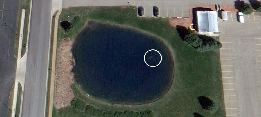 Car with body of man missing 9 years visible on Google Maps Car with body of man missing 9 years visible on Google Maps